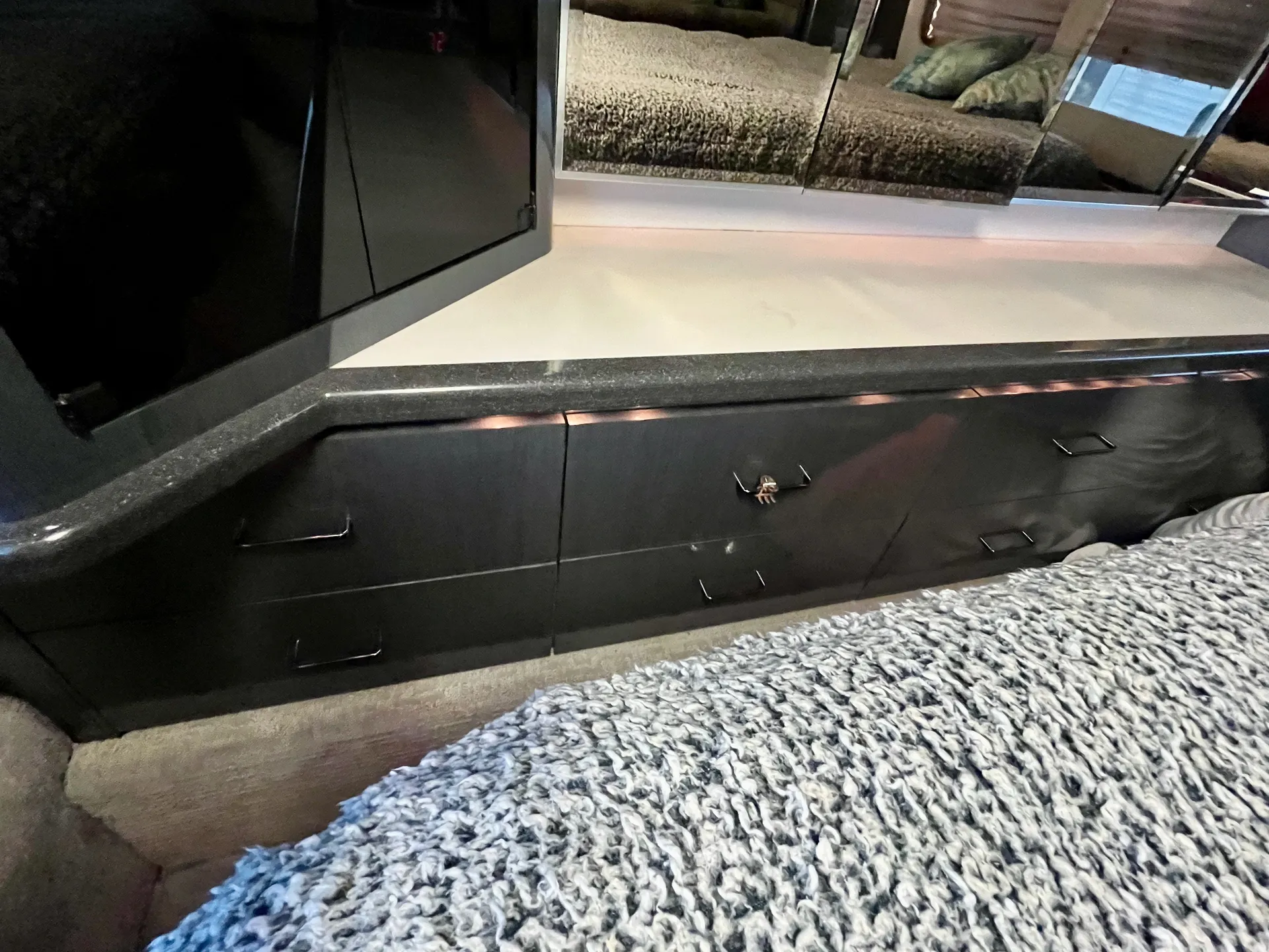 Under-bed drawer storage for linens and clothing