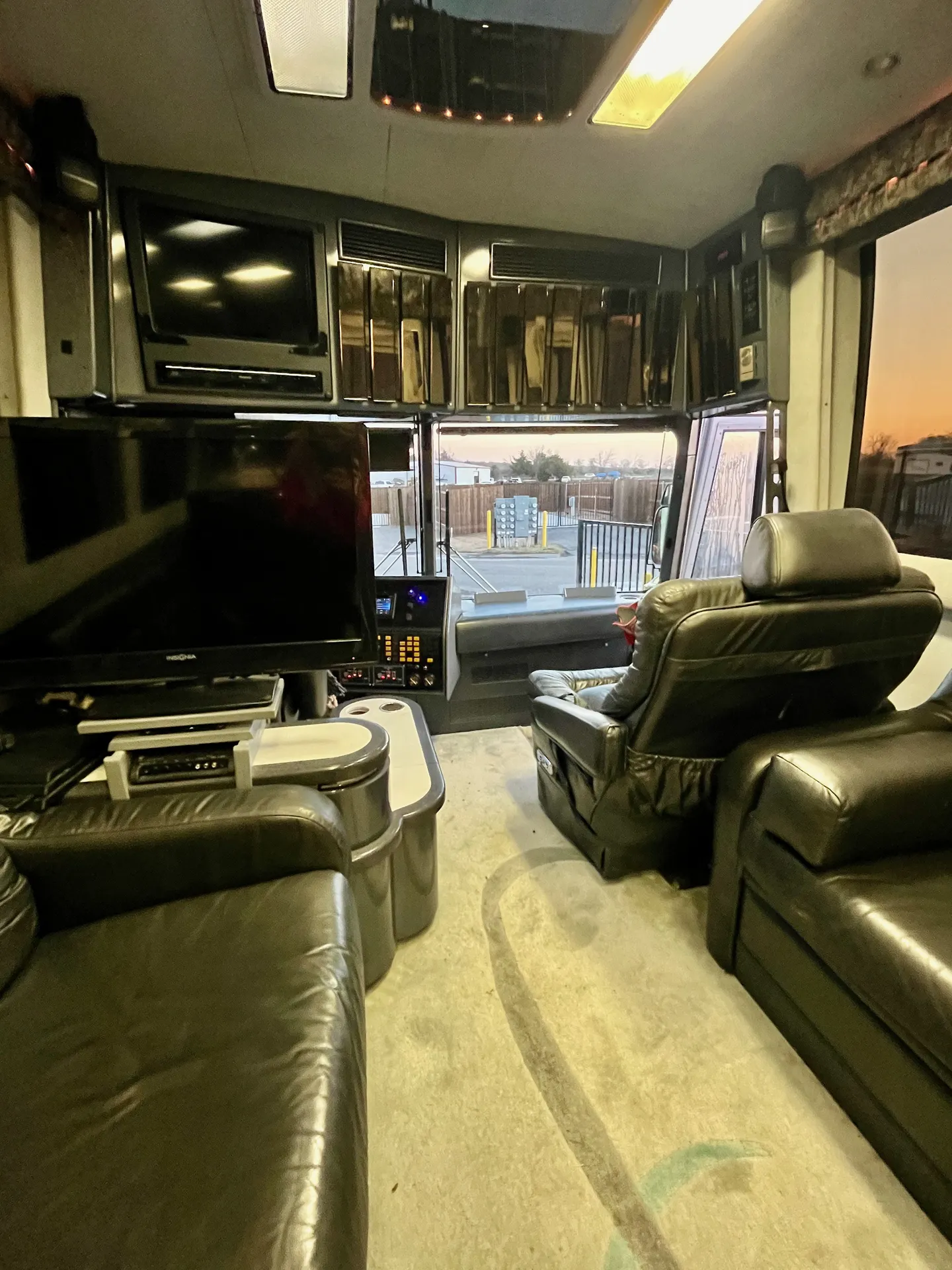 Dual captain's chairs with overhead entertainment