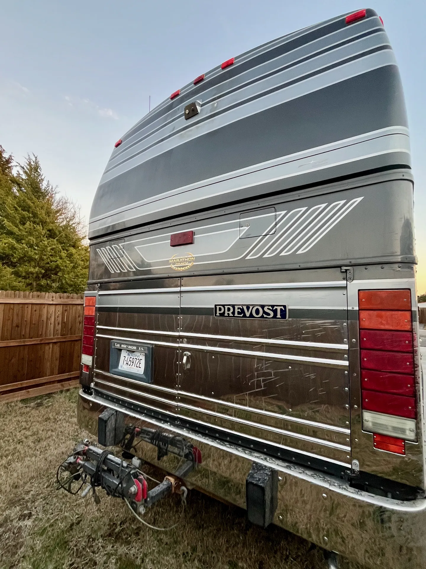 Rear view at sunset with PREVOST and Marathon Coach badges
