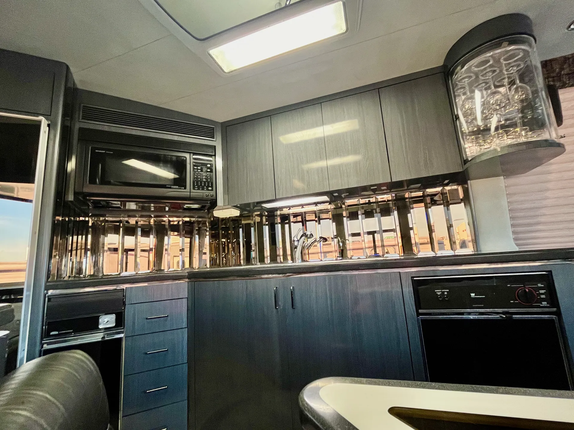 Kitchen overview with wine glass storage