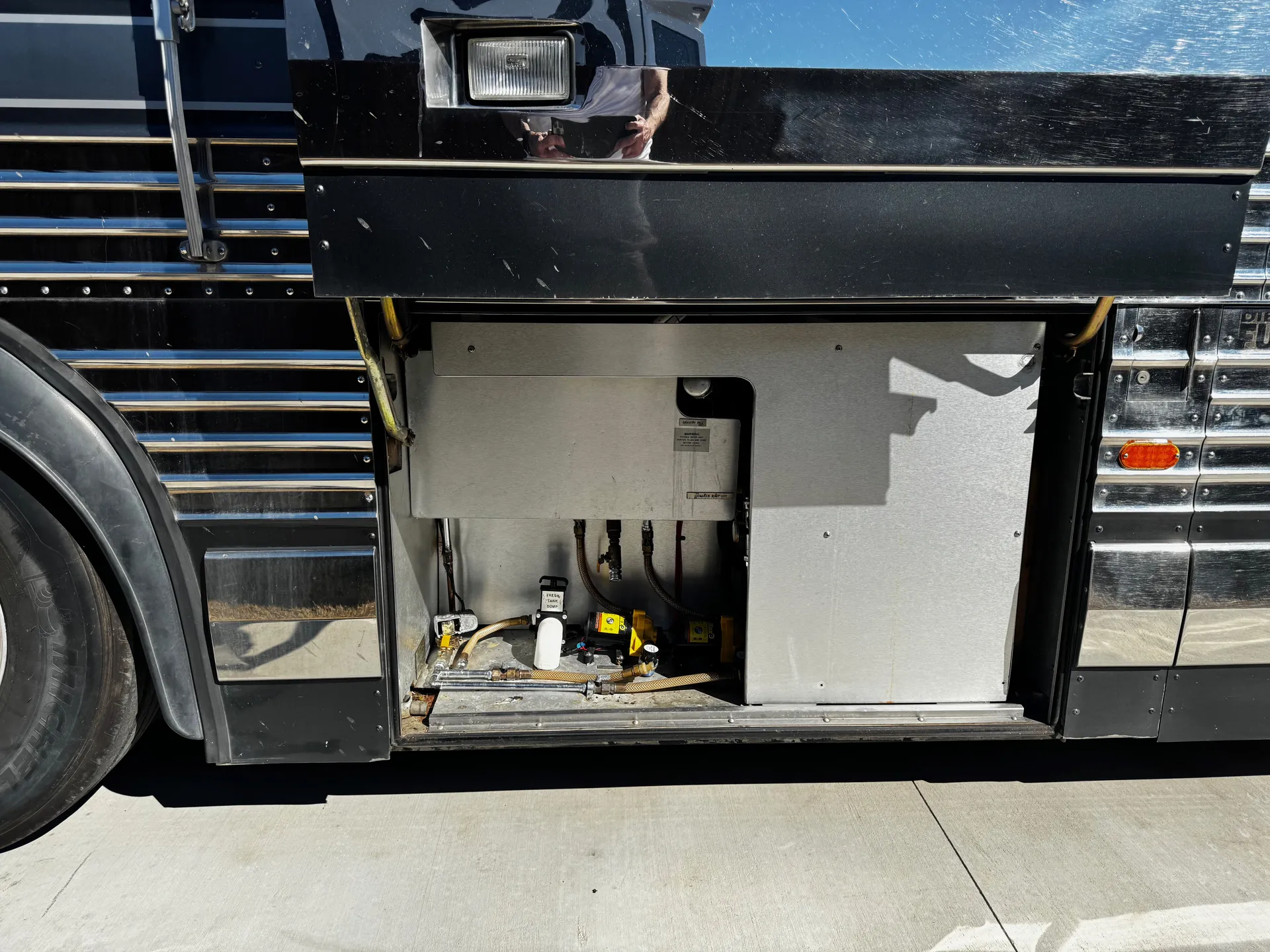 Water heater and utility bay access